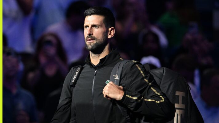 Novak Djokovic looks on