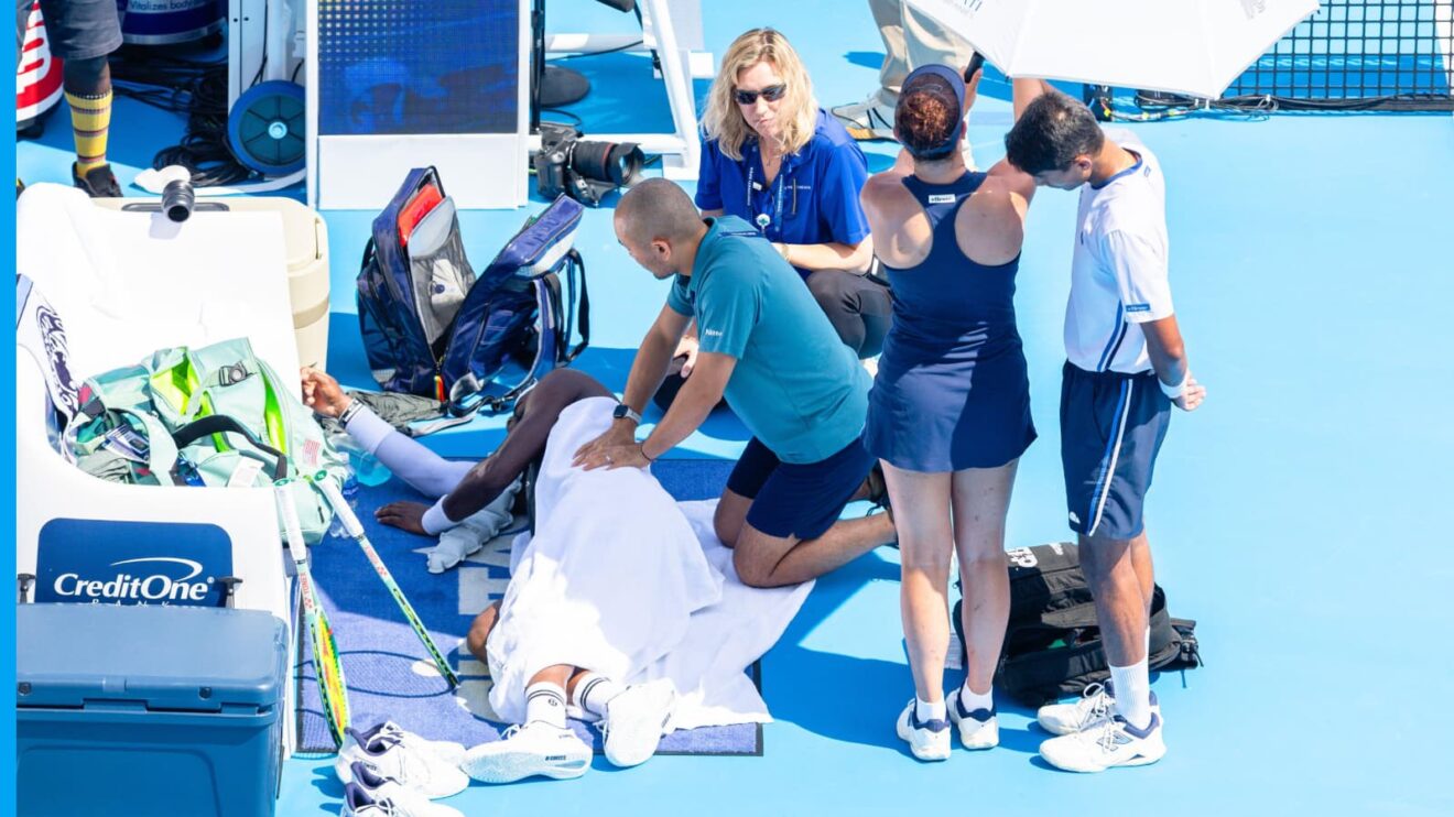 Frances Tiafoe receives treatment
