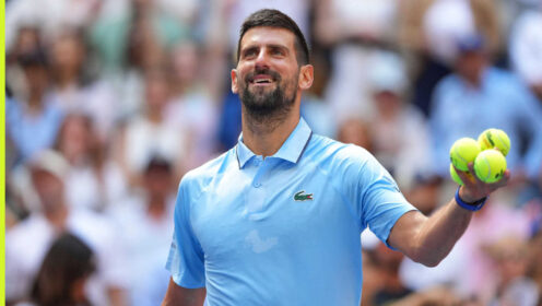 Pictured: A smiling Novak Djokovic