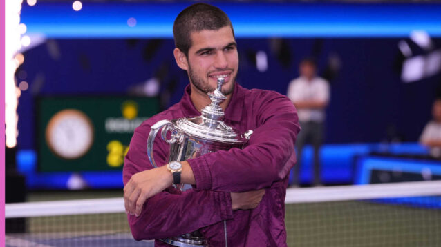 Pictured: Carlos Alcaraz hugs US Open trophy