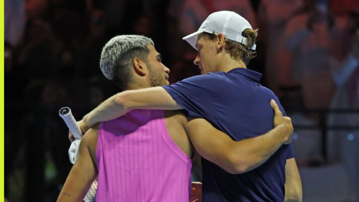 Carlos Alcaraz and Jannik Sinner embrace