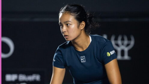 Pictured: Alex Eala prepares to serve.