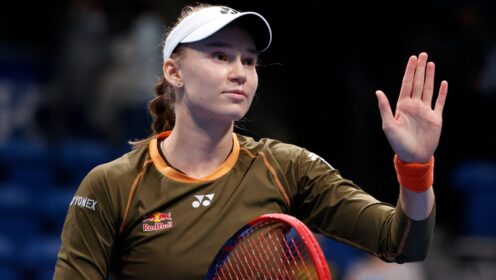 Pictured: Elena Rybakina waves after a win.
