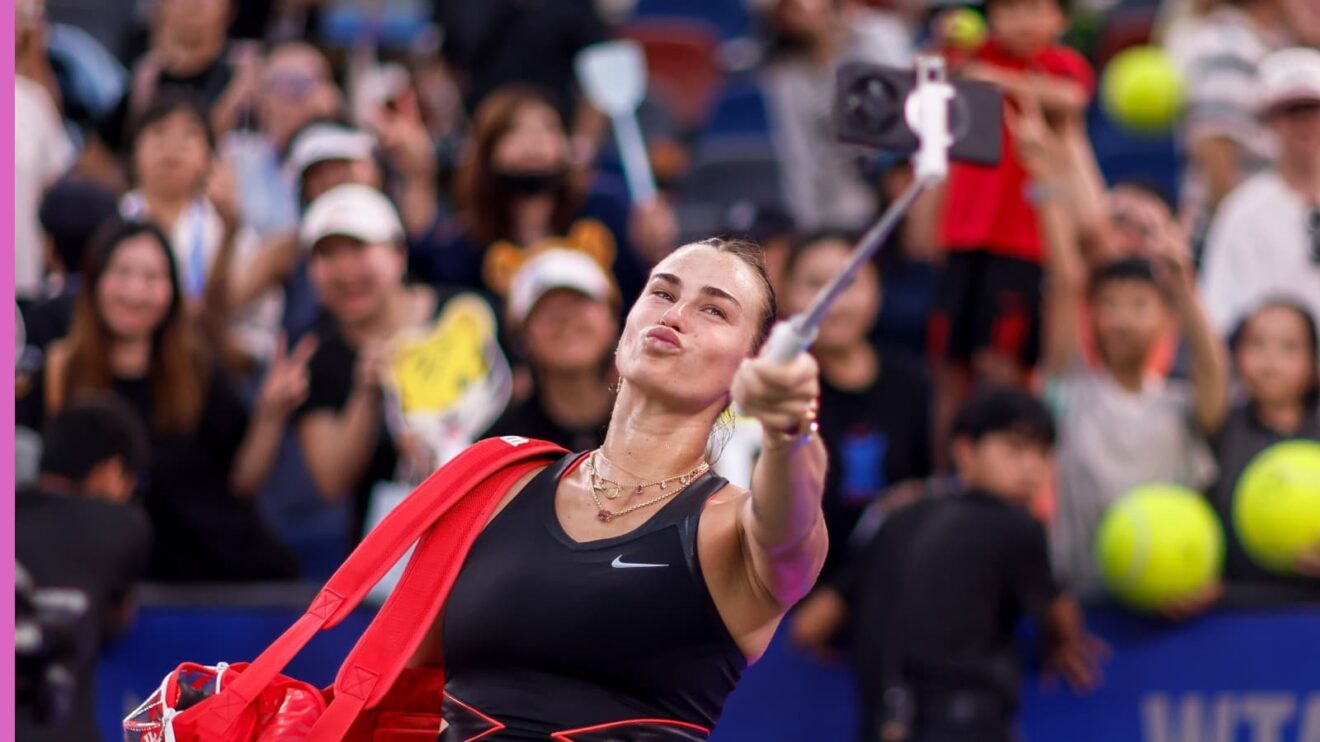 Aryna Sabalenka celebrates with fans