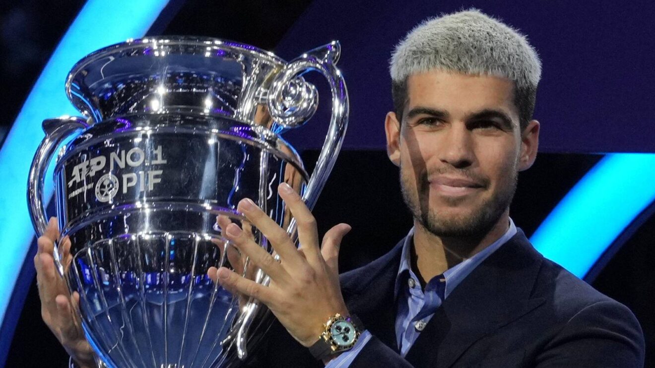 Pictured: Carlos Alcaraz lifts the year-end No 1 trophy.