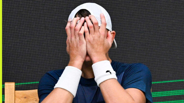 Pictured: Holger Rune in agony after picking up an injury