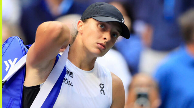 Pictured: Iga Swiatek leaves the court