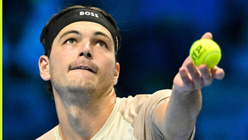 Pictured: Taylor Fritz serving