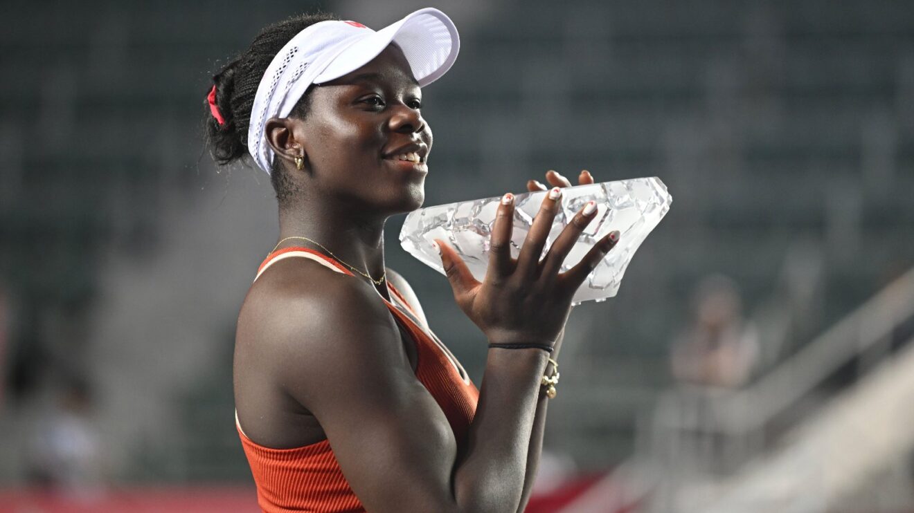 Pictured: Victoria Mboko lifts the Hong Kong Open title.
