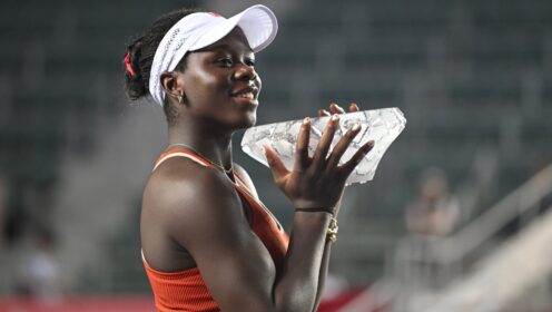 Pictured: Victoria Mboko lifts the Hong Kong Open title.