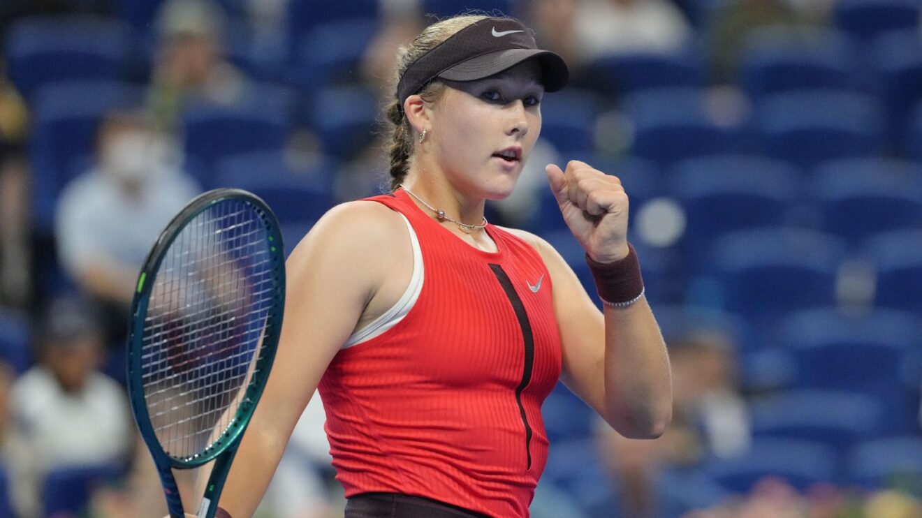 Pictured: Mirra Andreeva fistpumps during a match.