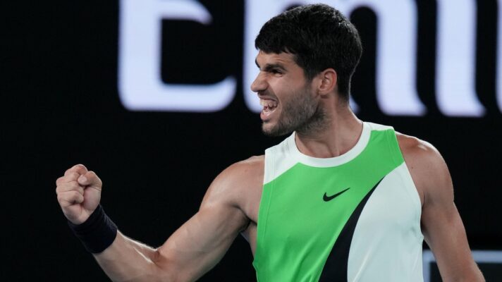 Pictured: Carlos Alcaraz fistpumps during a match win.