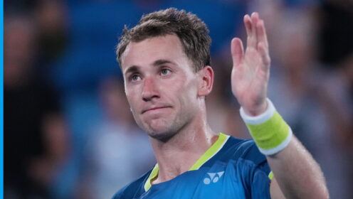 Pictured: Casper Ruud waves to the crowd after a win.