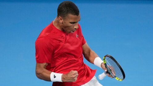 Pictured: Felix Auger-Aliassime celebrates during a match.