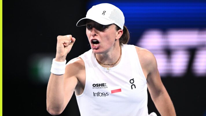 Pictured: Iga Swiatek celebrates during a match.