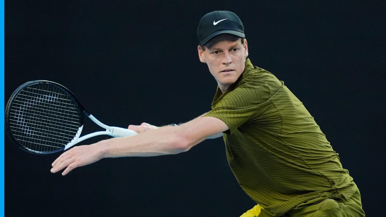 Jannik Sinner hits a forehand