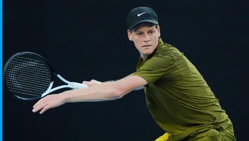 Jannik Sinner hits a forehand