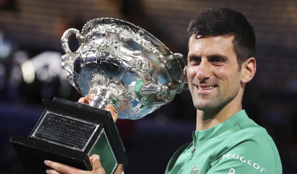 Novak Djokovic celebrates winning the Australian Open
