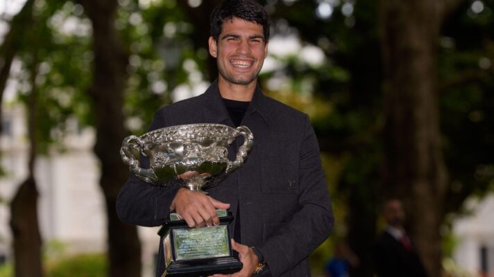 Carlos Alcaraz with the Australian Open trophy