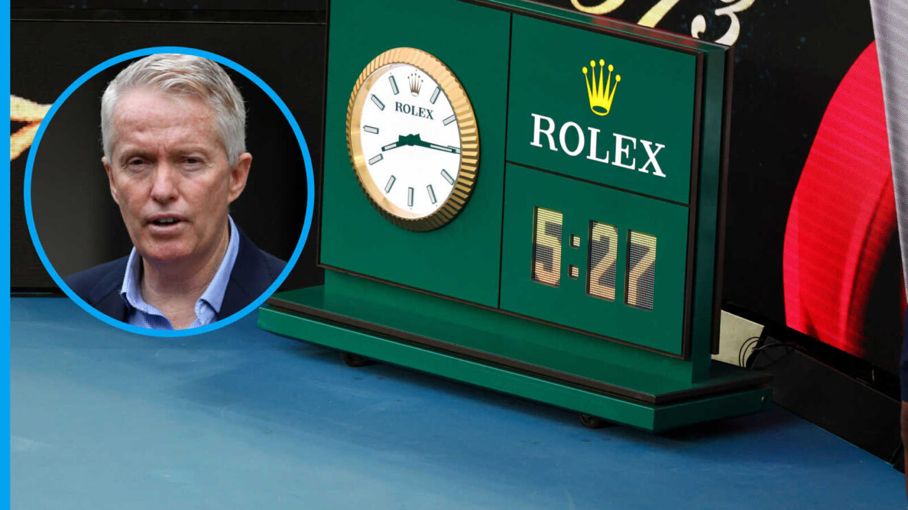 Pictured: Craig Tiley with Australian Open clock
