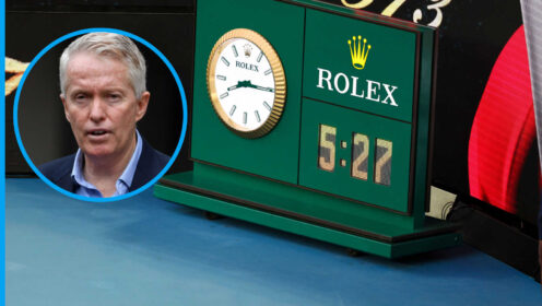 Pictured: Craig Tiley with Australian Open clock