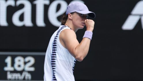 Pictured: Iga Swiatek fistpumps during a match.