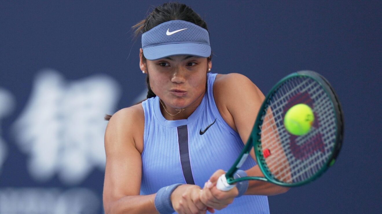 Emma Raducanu plays a shot