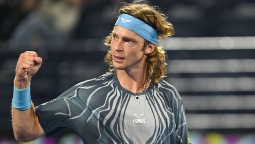 Pictured: Andrey Rublev fistpumps during a match.