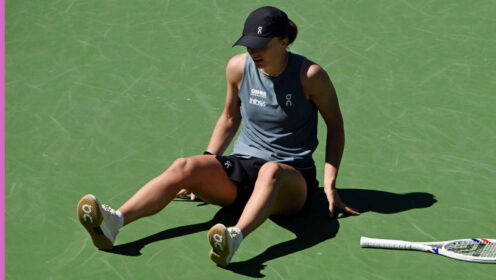 Pictured: Iga Swiatek falls during her match