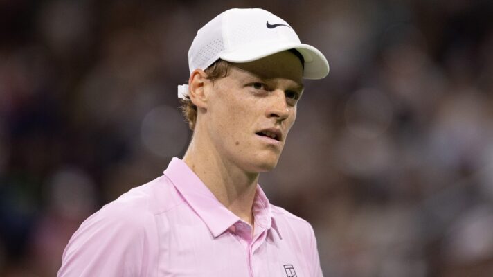 Pictured: Jannik Sinner looks on.