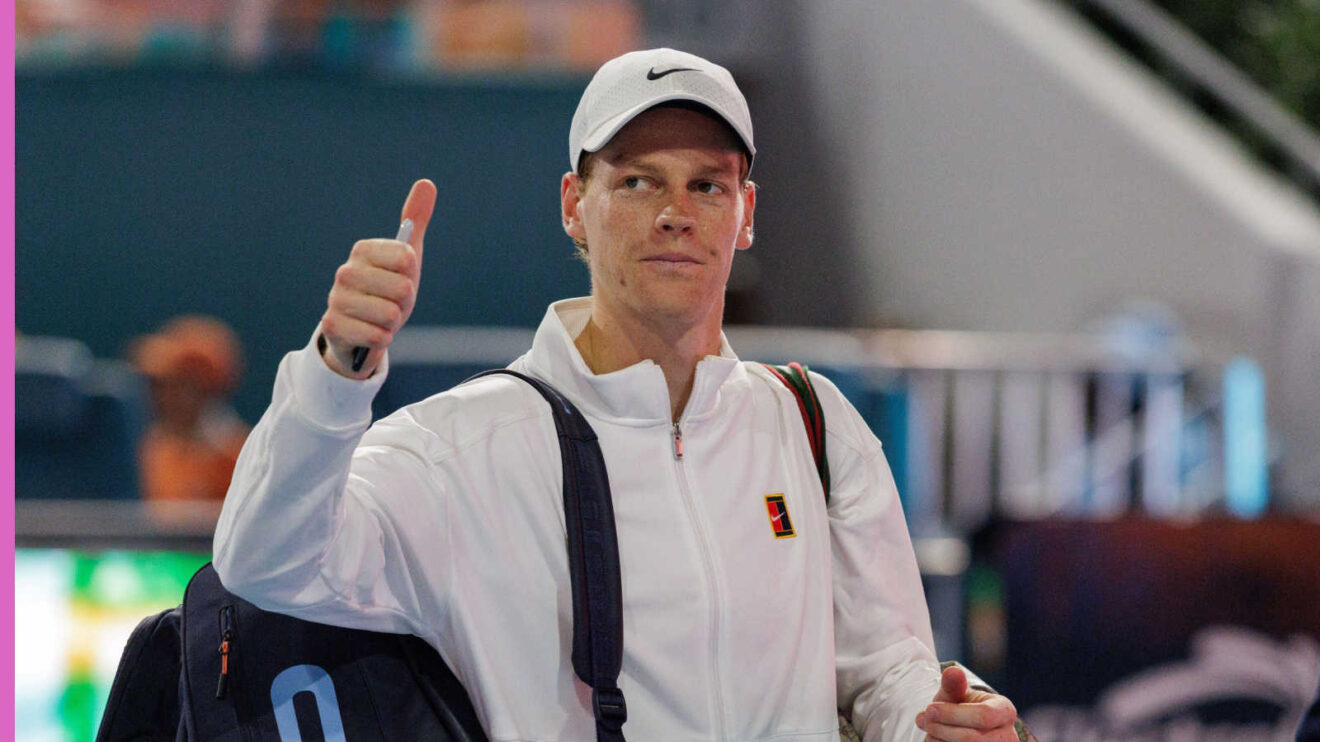 Pictured: Jannik Sinner thumbs up after his match