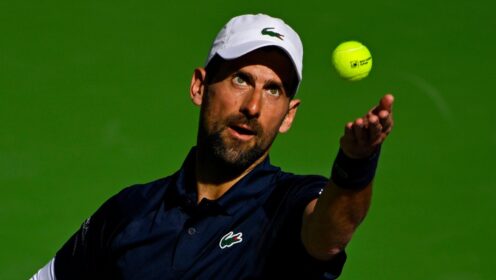 Pictured: Novak Djokovic during his service motion.