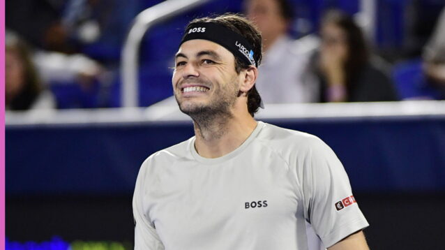 Pictured: Taylor Fritz looks on during a match.