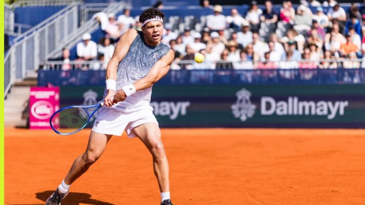 Ben Shelton hits a backhand