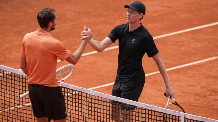 Daniil Medvedev shakes hands with Jannik Sinner at the Italian Open