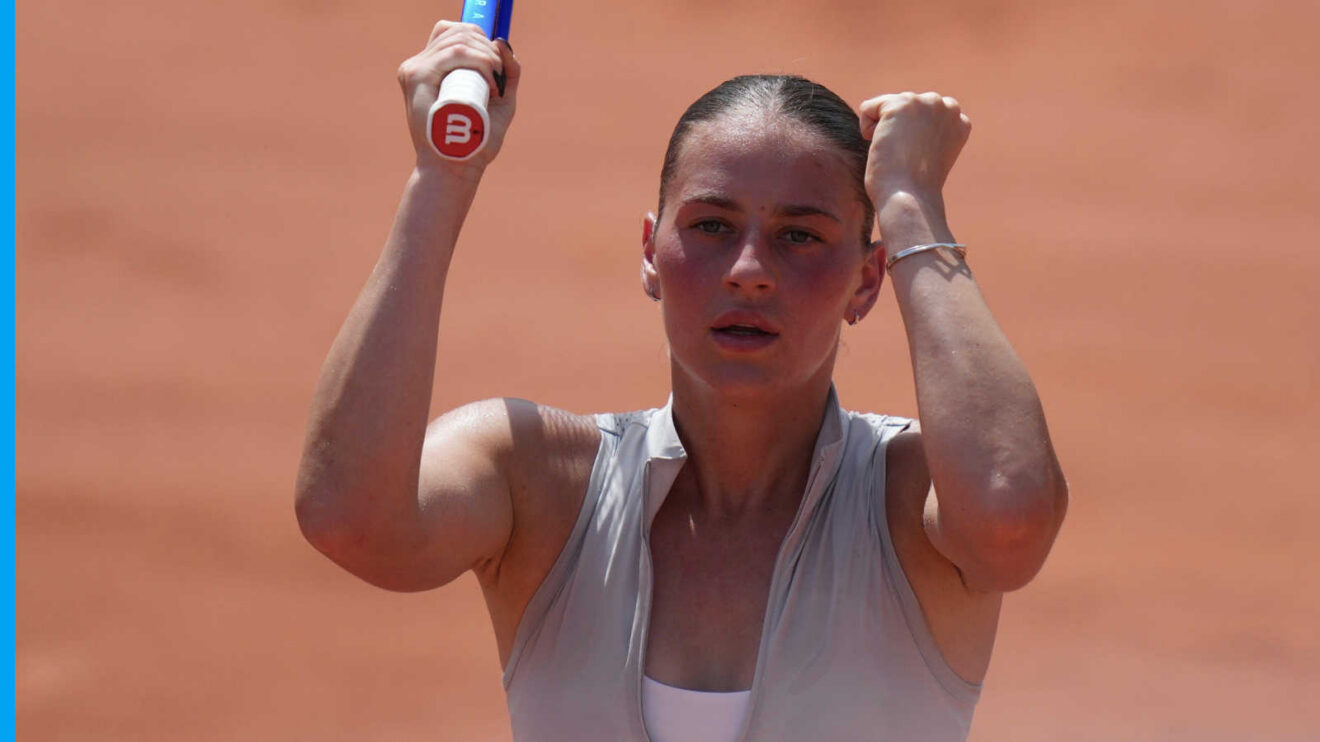 Pictured: Marta Kostyuk celebrates