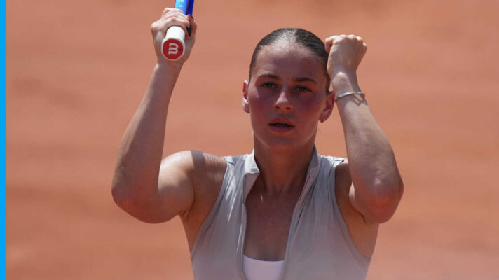 Pictured: Marta Kostyuk celebrates