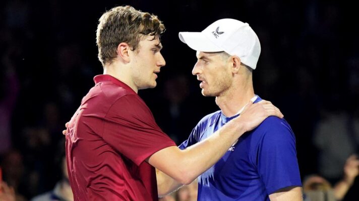 Pictured: Jack Draper and Andy Murray embrace at the net