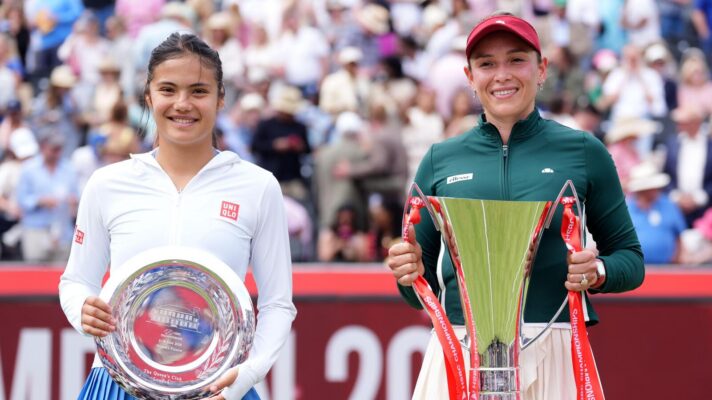 Pictured Emma Raducanu and Donna Vekic holding their Queen's Club trophies
