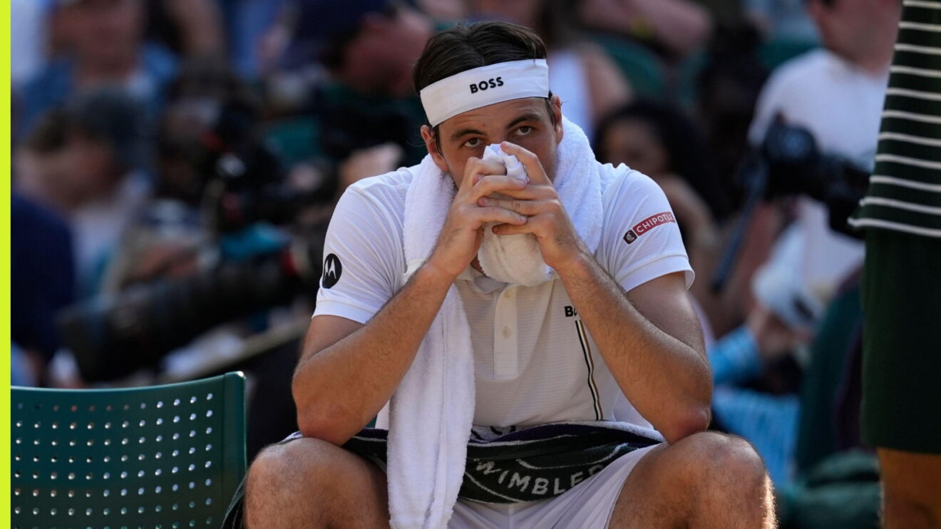 Pictured: Taylor Fritz puts his head in his hands at Wimbledon