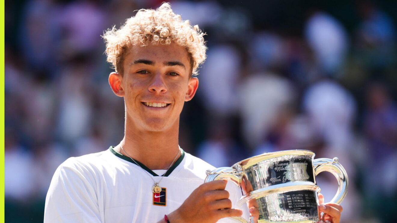 Pictured: Jordan Lee holding the Wimbledon boys' singles trophy