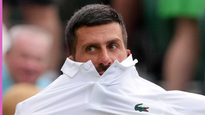 Pictured: Novak Djokovic changes his shirt during a match
