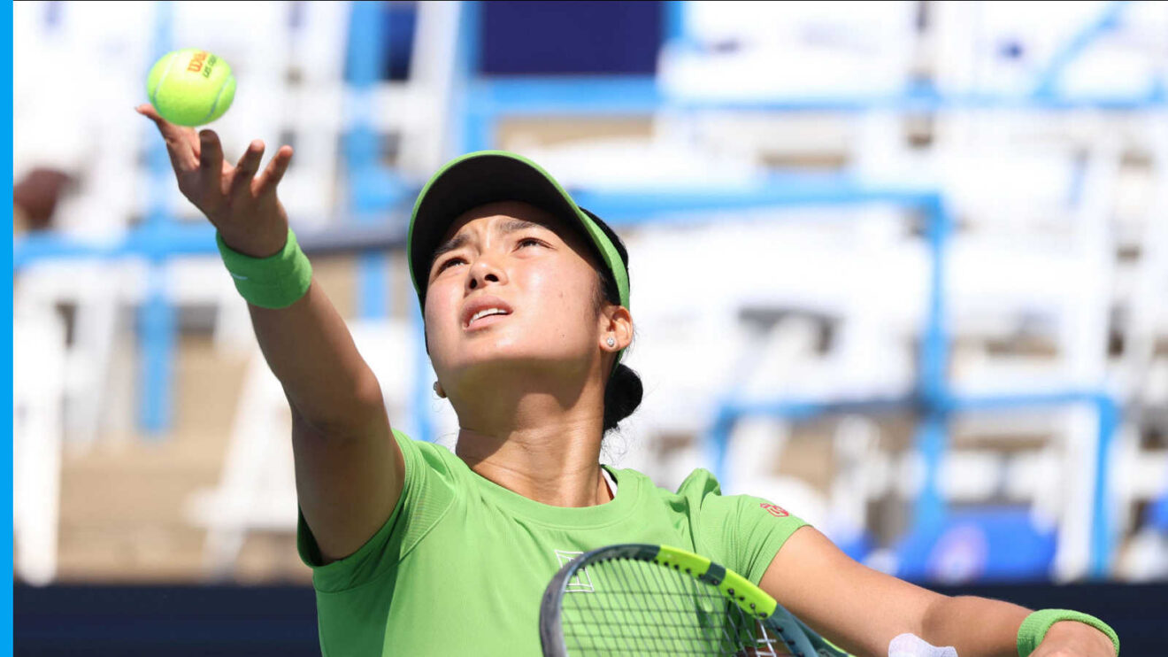 Pictured: Alex Eala serves during her match