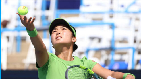 Pictured: Alex Eala serves during her match