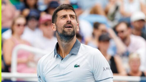 Novak Djokovic looks on during his match