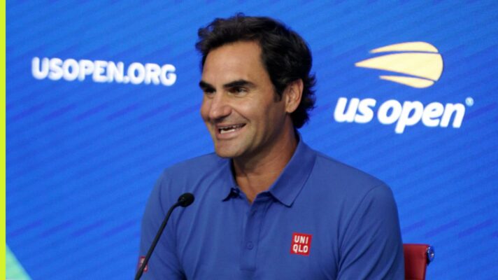 Roger Federer speaks to the media