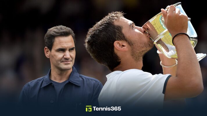 Pictured: Noah Rubin kisses his Wimbledon Boys' trophy, with Roger Federer in the background