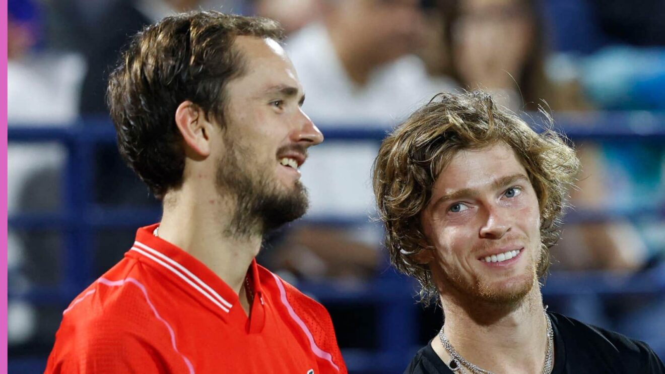 Pictured: Daniil Medvedev and Andrey Rublev smile