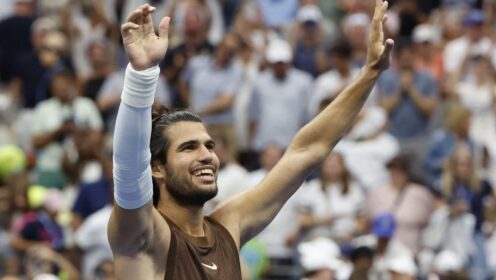Carlos Alcaraz celebrating after defeating Tommy Paul at the 2026 US Open.