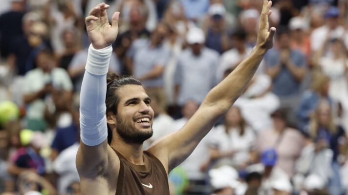 Carlos Alcaraz celebrating after defeating Tommy Paul at the 2026 US Open.